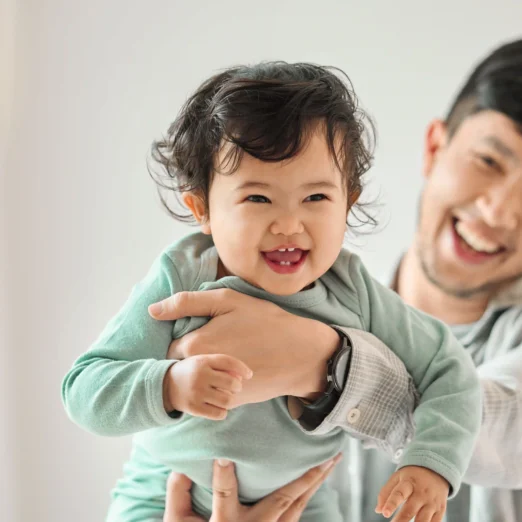 he-makes-parenting-look-easy-shot-of-a-young-man-2023-11-27-05-01-32-utc