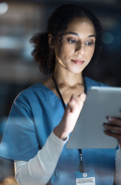 medical-tablet-nurse-and-black-woman-in-hospital-2025-04-06-11-40-13-utc Medical tablet, nurse and black woman in hospital working late on telehealth, research or online co.